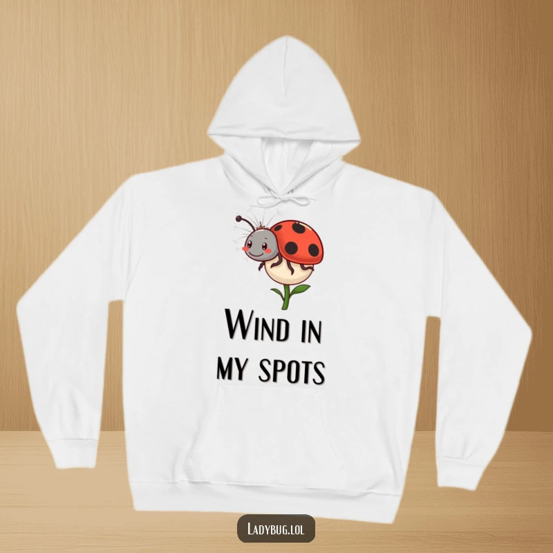 Funny Ladybug Dandelion Hoodie: A happy ladybug comically rides a dandelion seed, offering cozy whimsy and a reminder of simple joys. Soft and humorous.