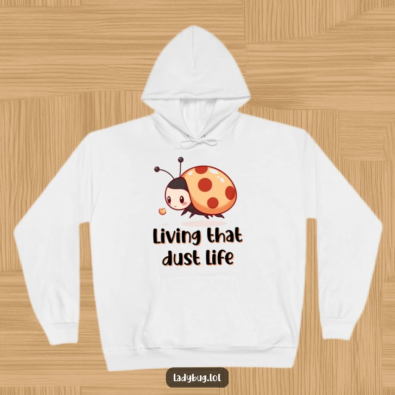 Funny hoodie featuring a determined ladybug character enthusiastically chasing a microscopic dust mote, ready for action.