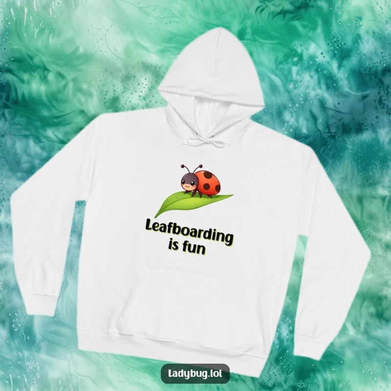 Funny ladybug hoodie showing a cheerful bug sliding down a dewdropped leaf. Cozy and humorous.