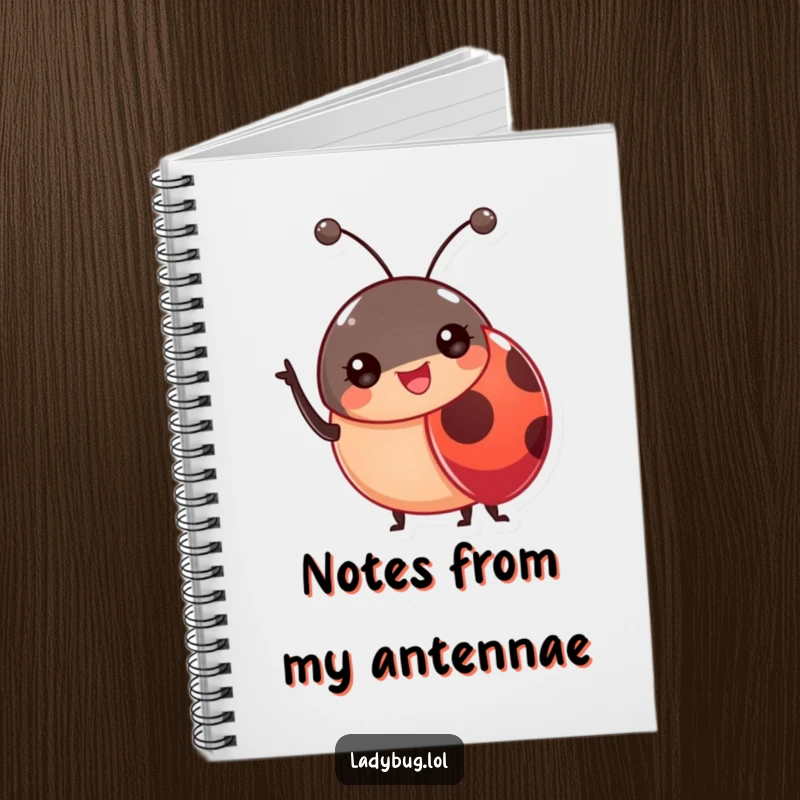 Funny Ladybug Antennae Notebook featuring a cheerful ladybug waving, designed for jotting down friendly notes.