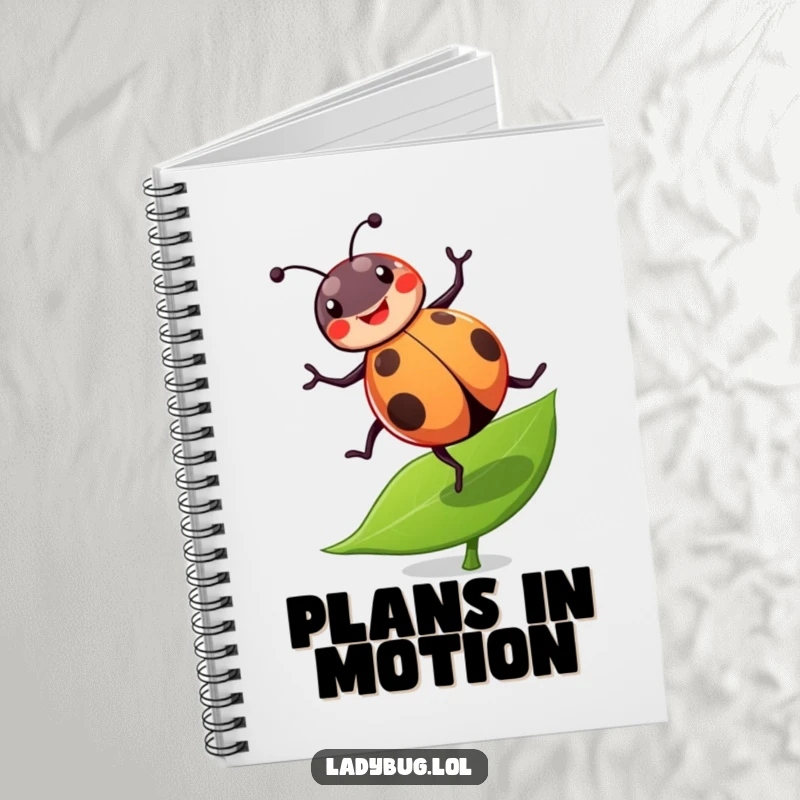 Funny ladybug notebook with a cheerful ladybug doing a joyful cartwheel on a leaf, perfect for humorous note-taking.