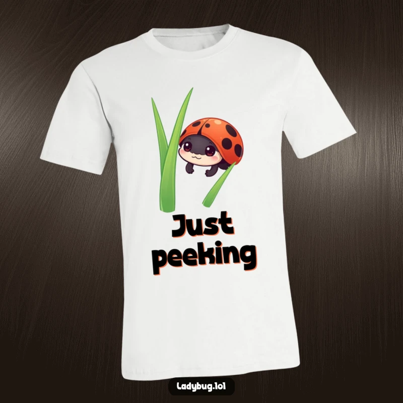 Funny ladybug t-shirt with an adorable ladybug character peeking coyly from behind a tall blade of grass.
