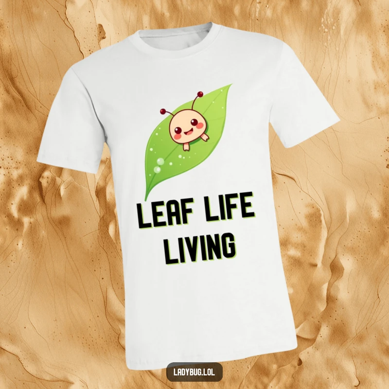 Funny ladybug sliding t-shirt, depicting the character joyfully sliding down a dewy leaf, a cute and humorous design.
