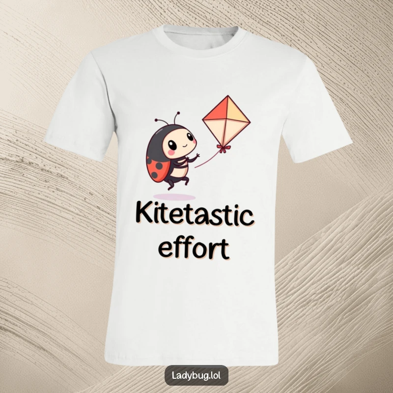 Funny ladybug t-shirt showing a playful ladybug comically attempting to fly a miniature kite, a humorous depiction of aspiring flight.