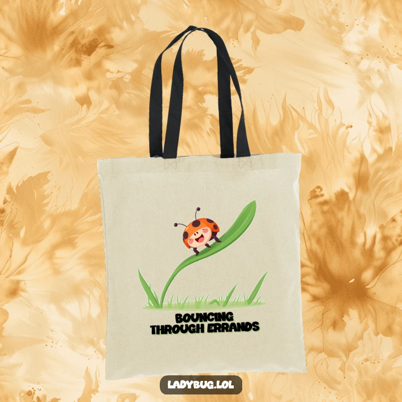 Funny ladybug bounces gleefully on a single blade of grass, radiating joy, on a versatile tote bag.