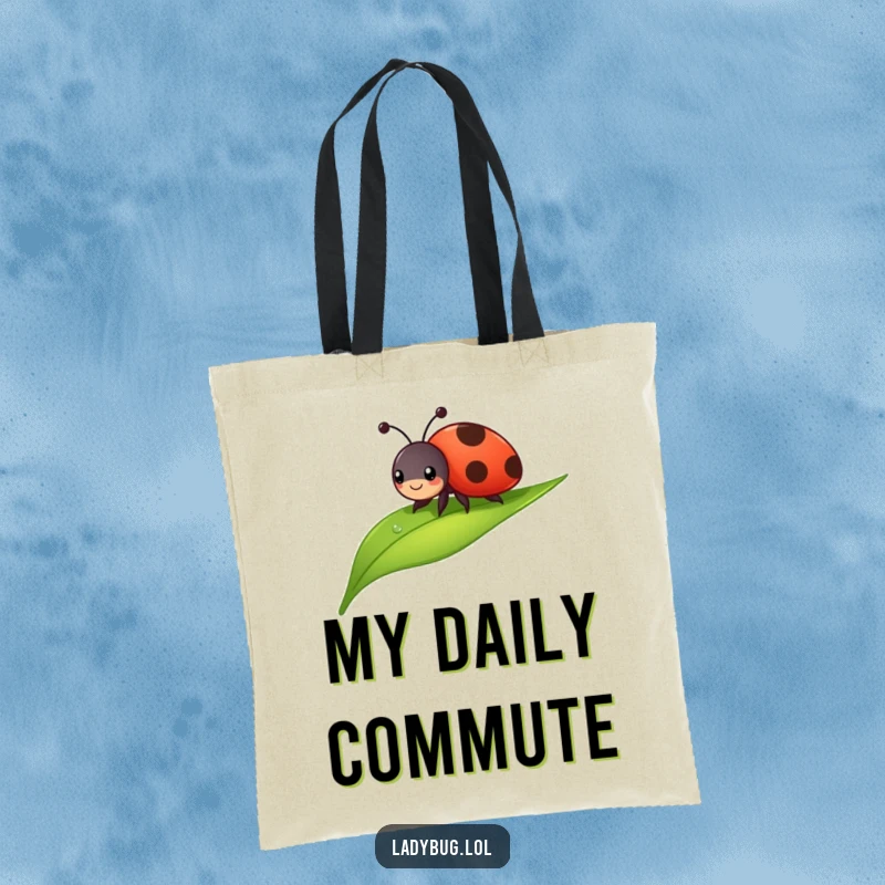 Funny ladybug tote bag with a cheerful bug sliding down a dewdropped leaf. Practical and humorous.