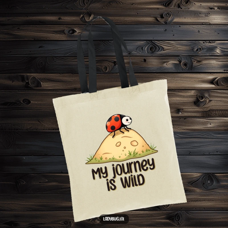 Funny ladybug tote bag with a ladybug rolling down a hill, perfect for carrying essentials with a humorous and adventurous bug theme.