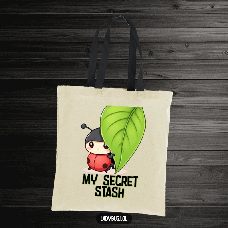 Funny tote bag showcasing a curious ladybug character peeking from under a leaf, great for carrying treasures.