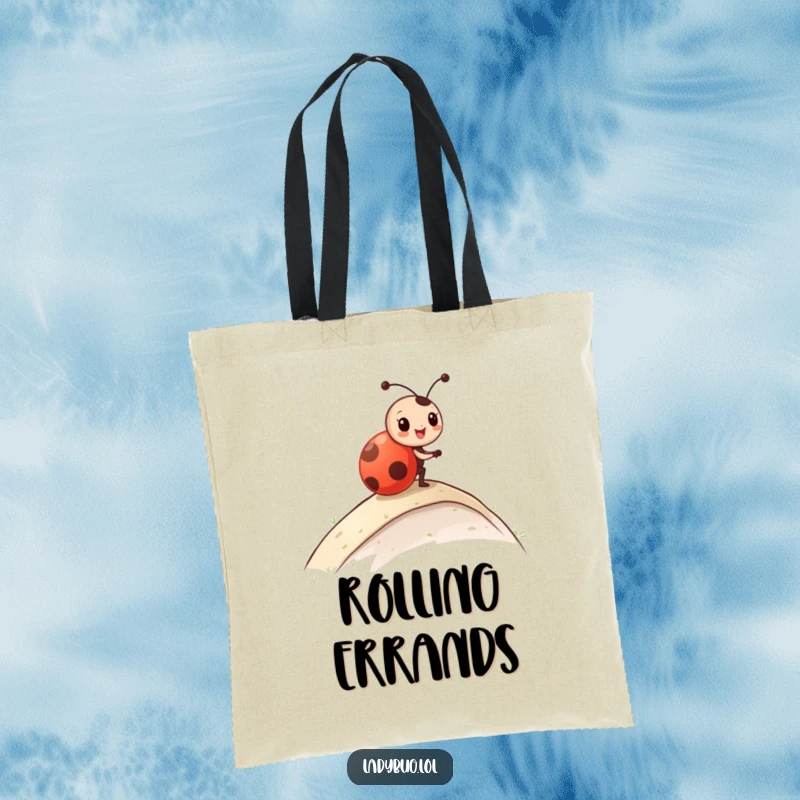 Funny Tote Bag illustrating a ladybug character in the act of happily rolling down a grassy slope, full of glee.
